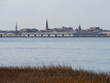 View of downtown Charleston, SC church steeples from across the harbor.