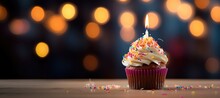 Delicious Tasty Cupcake With Candle On Dark Background.