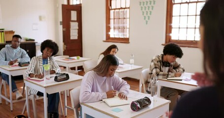 Poster - University, teacher in lecture and students attention at desk for education, learning and school work. Speaking, teaching and woman in college classroom with young men and women writing exam in books