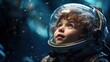 Little boy dressed as an astronaut exploring the stars.