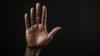 © AlexCaelus - Hand gesture isolated on black background