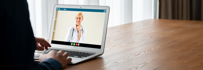 Doctor video call online by modish telemedicine software application for virtual meeting with patient