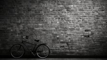 A Vintage Bicycle Leaning Against A Weathered Black And White Brick Wall
