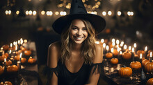 Halloween Witch. Beautiful Young Woman In Black Dress And Hat For Halloween Celebration.
