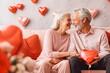 © VisualProduction - Beautiful caucasian elderly couple looking in love, concept of valentines day gift