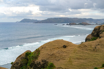 Wall Mural - incredible views across the coastline at the top of Bukit Merese Hill, Merese Hill is a location to see the sunrise and sunset in Lombok, coast of the sea, beach and sea, view of the, kuta mandalika