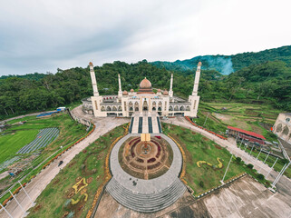 Wall Mural - Aerial Shot of Islamic Center Padang Panjang. Besides having four towers towering on each side. With its majestic shape, this building has become an icon of the city of Padang Panjang