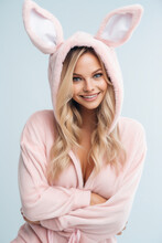 Pretty young woman wearing a bunny pyjamas costume