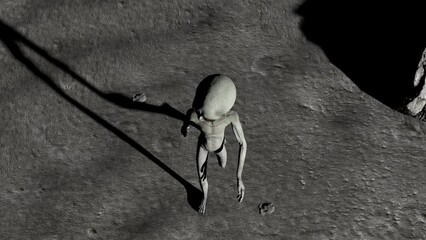 Wall Mural - scary gray alien walking on the surface of the moon. planet earth is visible. ufo futuristic concept