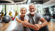 © Kateryna - An elderly pair stretching together before a fitness class, focusing on flexibility and mobility, elderly couples