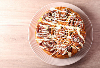 Wall Mural - Cinnamon rolls cake, with icing,