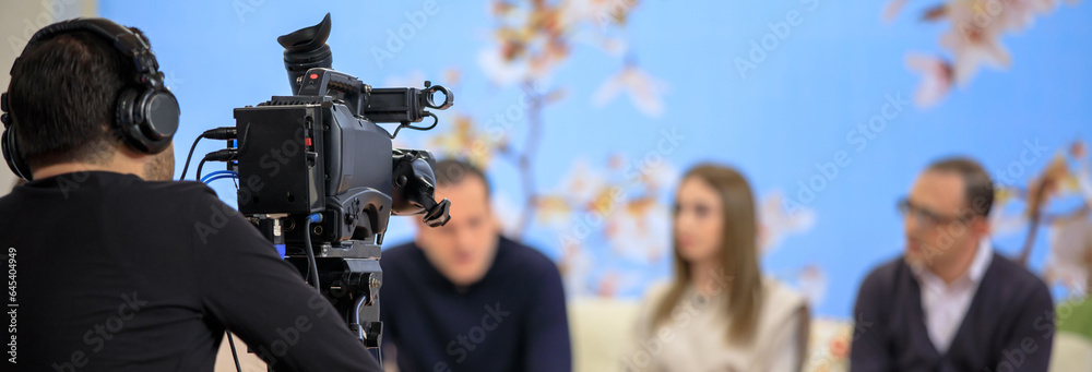 Video Interview On Set people on set for a TV interview Stock Photo | Adobe Stock