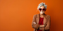 A Beautiful Old Woman Laughing On A Plain Red Background, Fashion