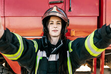 Selfie Of Female Firefighter In Protective Helmet And Uniform