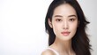© WS Studio 1985 - Young cheerful woman looking at the camera, beauty and spa, Asian woman portrait on a white background. generative ai