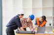 © PHAISITSAWAN - Concept meeting engineers or architects for projects working with partners and engineering tools to create models and blueprints at the job site. construction concept. Engineer concept.