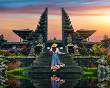 Women Tourists Standing At Besakih Temple In Bali, Indonesia.