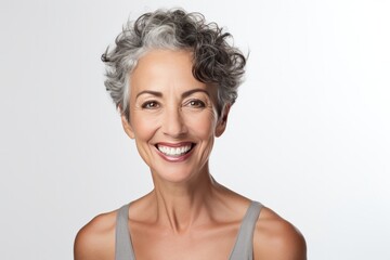 Portrait of Healthy Smiling Middle Aged French Woman with Stylish Haircut on White Copy Space.