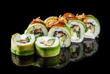 Fototapeta Kuchnia - sushi roll green dragon with eel avocado cucumber cream cheese on a black mirror background