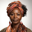 A 48-year-old African woman with a captivating expression in a close-up studio portrait.