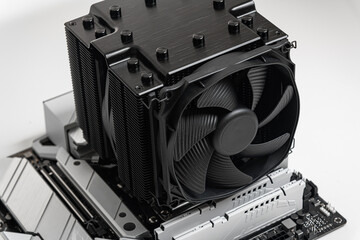 Poster - Installing a large air cooler on a computer processor.