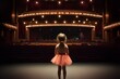 © Pedro - ballet kid with big dreams in an empty theatre arena