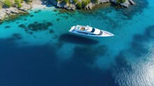 Aerial Drone Top Down Of Luxury Boat In Blue Sea