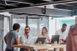 © qunica.com - Different Aged Team of Confident Entrepreneurs Is Analyzing Reports and Creating a Strategic Plan for Future Success