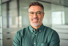 Smiling 45 Years Old Banker, Happy Middle Aged Business Man Bank Manager, Mid Adult Professional Businessman Ceo Executive In Office, Older Mature Entrepreneur Wearing Glasses, Headshot Portrait.