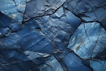 Richly Detailed Rock With Blue Variants. Stone Full Of Curves And Smooth Cuts Resulting From The Erosive Effect Of Sea. Close Up Rocks, Texture Dramatic And Colorful Erosional Water Formation. Natural