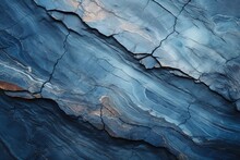 Richly Detailed Rock With Blue Variants. Stone Full Of Curves And Smooth Cuts Resulting From The Erosive Effect Of Sea. Close Up Rocks, Texture Dramatic And Colorful Erosional Water Formation. Natural