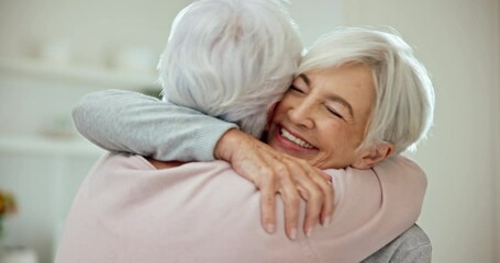 Canvas Print - Hug, welcome and senior woman friends in the living room of their home during a visit in retirement. Smile, love and a happy elderly person embracing her sister while feeling excited together