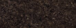 Abstract brown plastered textured grunge background, horizontal banner, in the form of a rough covered stucco wall, closeup