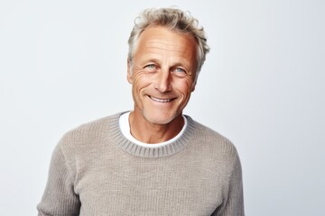 Portrait photography of a Swedish man in his 50s against a white background