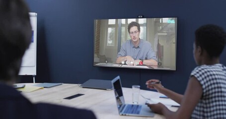 Poster - Diverse business people on video call with caucasian male colleague on screen