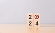 © Kannapat - 2024 Action Plan. Cubes with text 2024, New year goals.