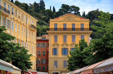 Wall Mural - Ornate Mediterranean house facades at the Cours Saleya outdoor farmers market in Old Town Vieille Ville in Nice, French Riviera South of France