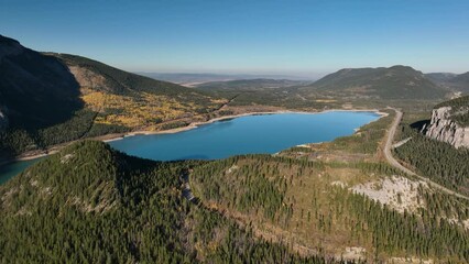 Wall Mural - drone view of a forest, rivers and mountains in the rocky mountains. landscape from the air. video f