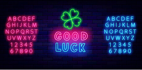 Wall Mural - Good luck neon label. Clover leaves. Saint Patrick day. Handwritten colorful inscription. Vector stock illustration