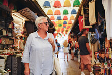 Senior Woman Tourist On A Turkish Market