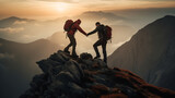 Fototapeta Góry -  Friendship. Mountain climber helping friend to reach the peak