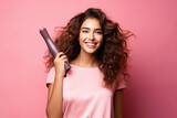 excited young indian woman with colorful hair holding hairdryer.