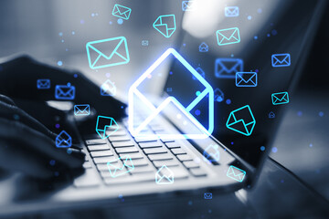 Aufkleber - Close up of female hands using laptop keyboard on desk with glowing email letter icons on blurry background. Communication and business message concept.
