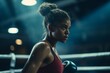 young black woman ready for fight in a boxing ring