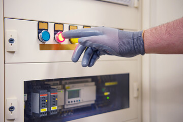 The electrician installed a new distribution system with an automatic switch. The industrial display shows the voltage of the electrical circuit.