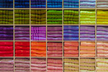 Leinwandbilder - Colorful folded towels stack, hotel service concept background
