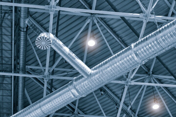 Leinwandbilder - Ventilation pipes in abstract futuristic interior metal construction background in blue tones