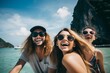 © Romana - a group of young diverse people students taking a selfie on a wide angle on a vacation in the tropical sunny land, ocean or sea in the background, Thailand or Bali