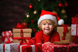 © Andrii  - Christmas Morning Delight: Child and Gift Boxes