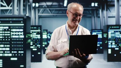Poster - capable serviceman expertly managing data while navigating in industrial server room. proficient rep